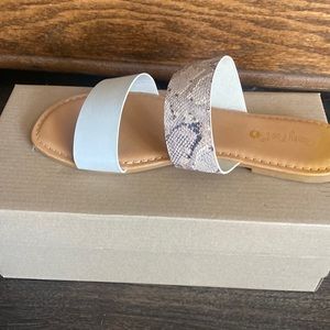 Sunny feet sandals. Ivory and snakeskin. Never worn